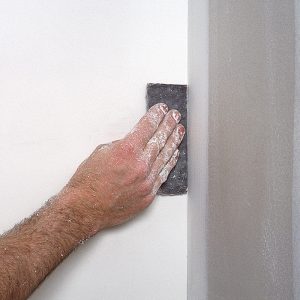 Folded sandpaper for tight spots 